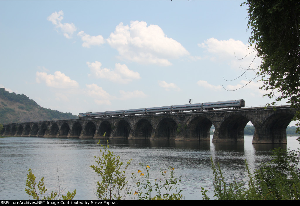 The eastbound Pennsylvanian on Rockville bridge heading into Harrisburg